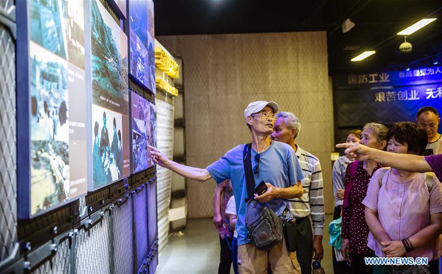 Visitors view exhibits at Third Line Construction in Guizhou Museum