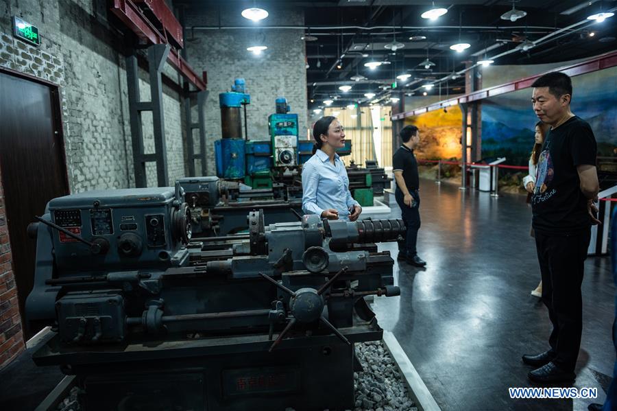 Visitors view exhibits at Third Line Construction in Guizhou Museum
