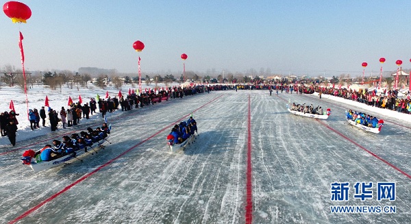Dragon boating held in Duolun on ice-covered lake