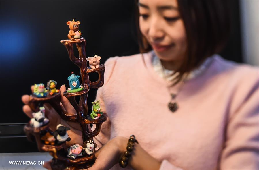 Dough modelling maker combines traditional Chinese skill with lovely designs