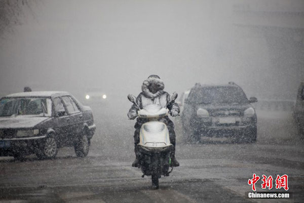Early spring snowfall hits NE China