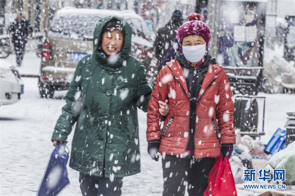 Early spring snowfall hits NE China