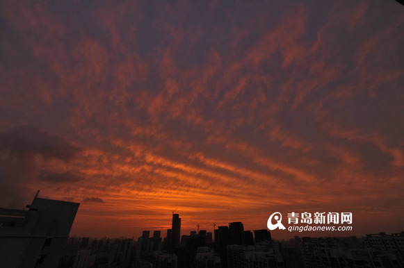 Burning clouds illuminate Qingdao sky