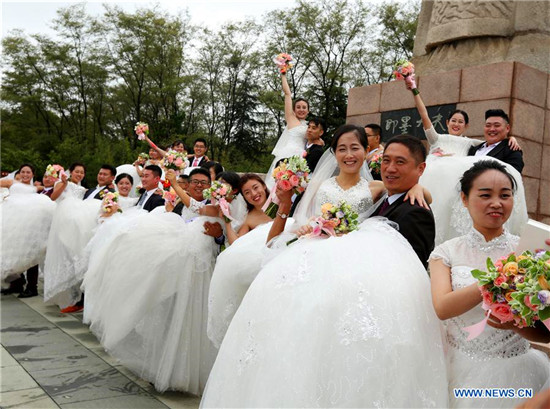 Group wedding ceremony held in Qingdao