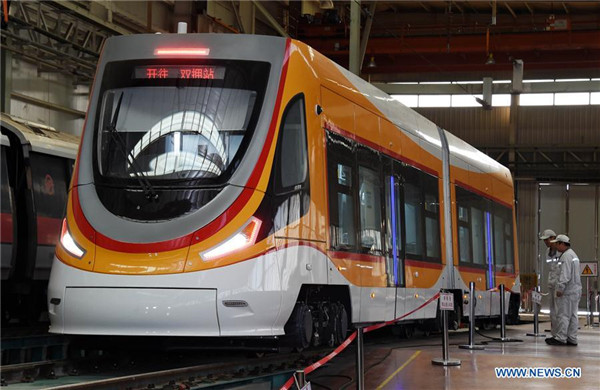Technicians check tram designed for high-altitude region in Qingdao