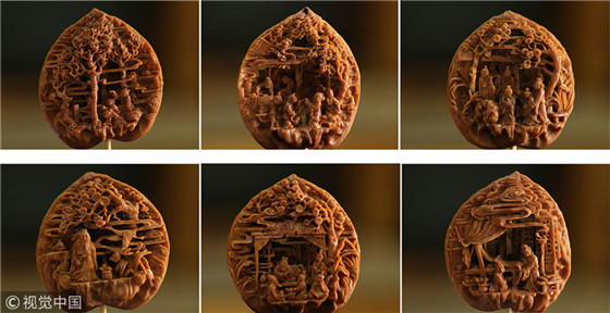 Carving the world on a peach pit