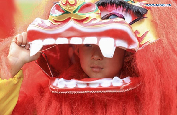 Dragon and lion dance competition held in Linyi