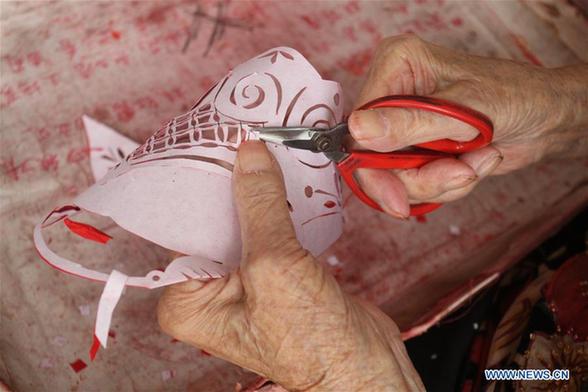 Paper-cuttings made by 103-year-old woman