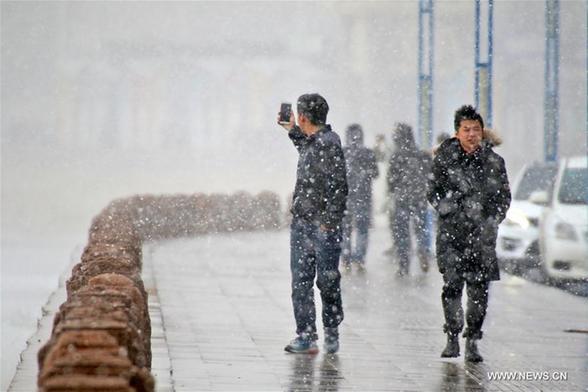 Yantai witnesses first snowfall this winter