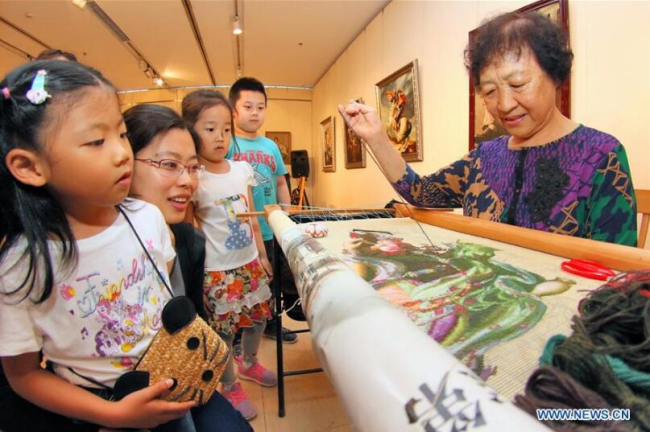 Intangible cultural heritage exhibition held in Yantai