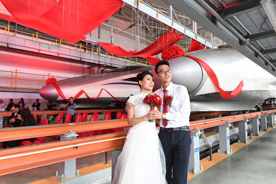 Couples start new journey at bullet train maintenance center