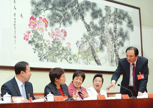 Shanxi congress delegates discuss report