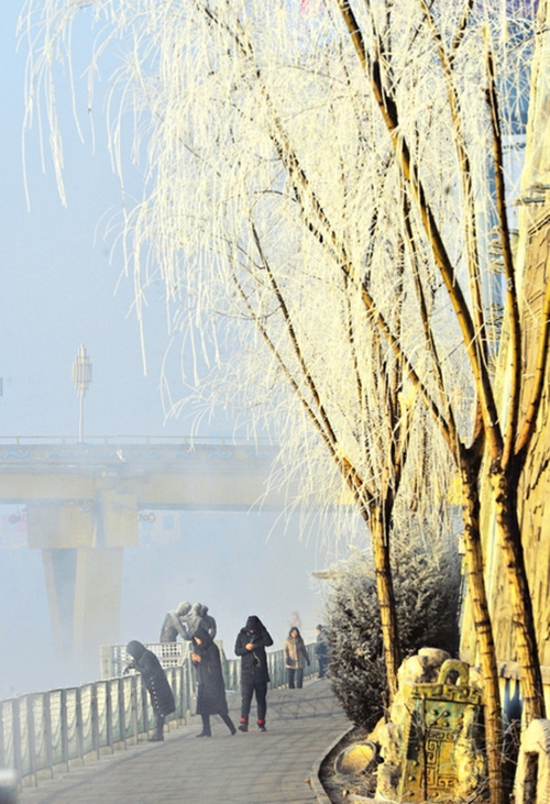Douqi River glimpsed through morning mist