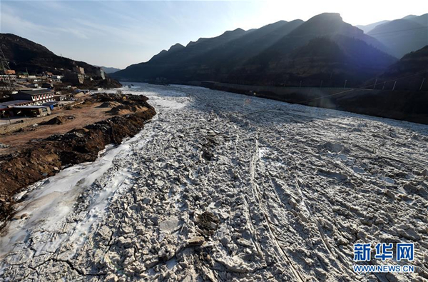 Ice blocks float through Linfen