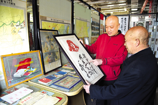 Lei Feng exhibition held in Pingding county