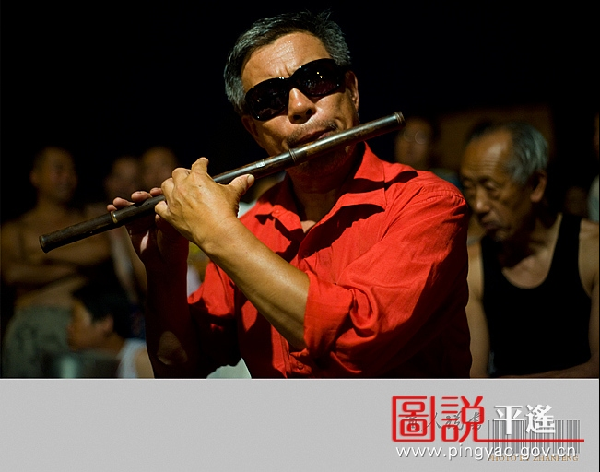 Pingyao's story-telling accompanied by stringed instruments