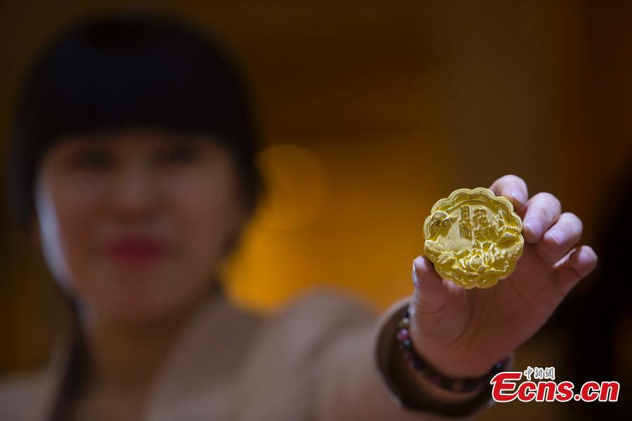 Gold mooncakes up for sale in Taiyuan
