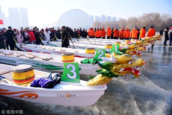 Shenyang holds icy dragon boat race