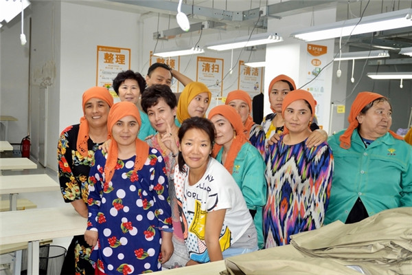 Once laid-off girl tailors jobs for women in Xinjiang