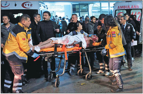 Turkey mourns as bombs near stadium kill 38