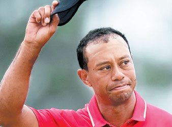 Pain keeping Tiger muted