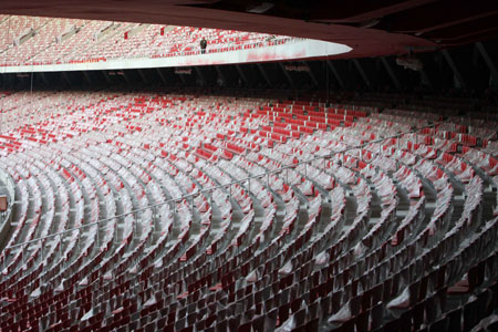 A photo, taken on Feb. 17, 2008 in Beijing, shows an interior views of China's National Stadium, also known as the 'Bird's Nest'. Constructions of the 91,000-seat arenas, the venue to hold the opening and closing ceremonies for the coming Olympics, near completion as the 80,000 unmovable seats have been installed by the end of January. [Xinhua]