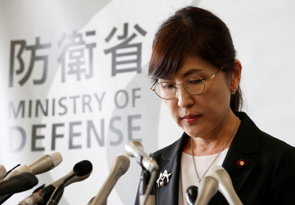 Inada resignation adds to Abe's woes