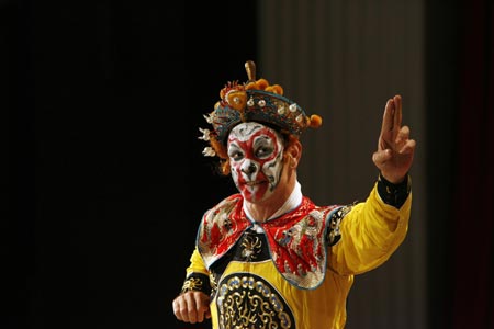 Ghaffar Pourazar of Britain performs in a special English version of the traditional Chinese opera Monkey King, in a theatre in Shanghai December 8, 2006. Pourazar is the first foreigner to complete the rigorous training at the Beijing Opera School and the National Academy. He is performing with Chinese artists from the International Centre for Beijing Opera, and other troupes, at their first show in Shanghai.