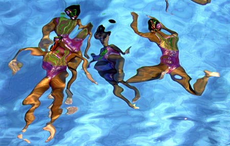 Mexico's synchronized swimming team perform their routine in the team event final at the Central American and Caribbean games in Cartagena, Colombia July 26, 2006. Mexico's team won the gold medal.