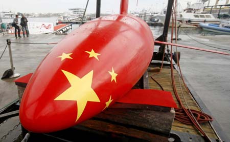 America's Cup challenger China Team boat CHN95 is displayed during its unveiling ceremony two days before the Valencia Louis Vuitton Act 13 Fleet-Race competition in Valencia April 1, 2007.