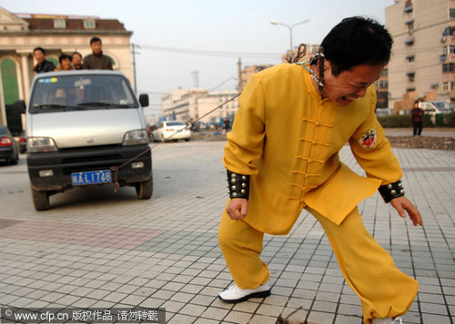 Stunt show: pull a car with eye, ear