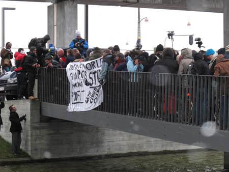Protesters march outside Copenhagen summit venue