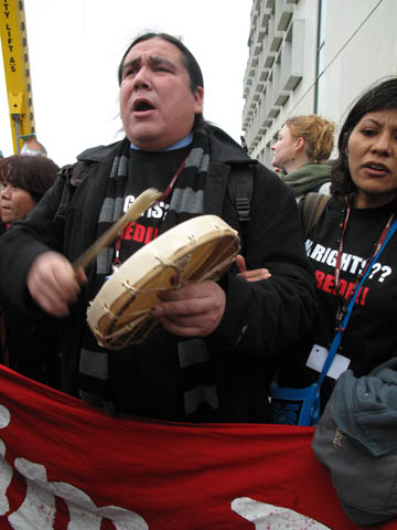 Protesters march outside Copenhagen summit venue