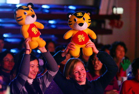 Chinese and foreign residents embrace Year of Tiger