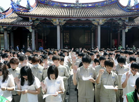 Middle school students take oath to be adults