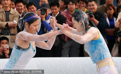 Mud wrestling contest in Hainan