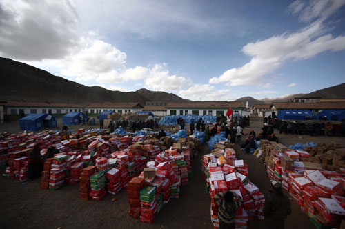 Villagers in Longbao welcome supplies