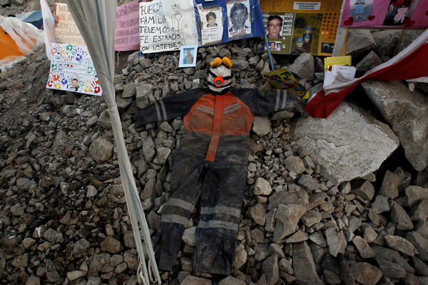 Pray for 33 trapped miners in Chile