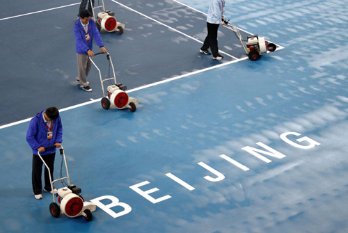 Rain postpones singles finals to Monday at China Open
