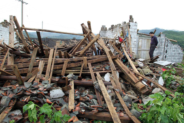 Heavy rainstorm damages houses in SW China