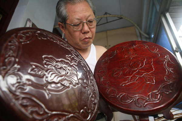 Wood craftsman follows in forefathers' steps