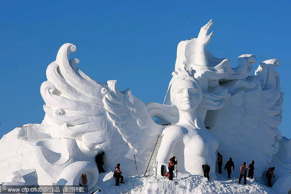 Swan girl rises out of snow in NE China