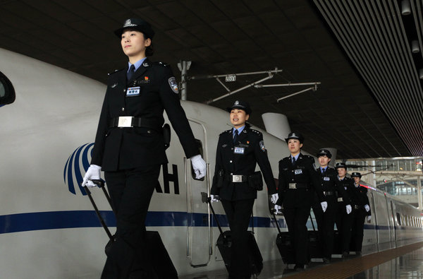 Policewomen serve on high-speed trains