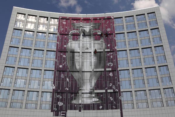 Building decorated with huge Euro 2012 trophy