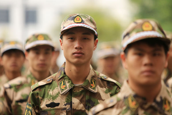 New recruits march off to a new life