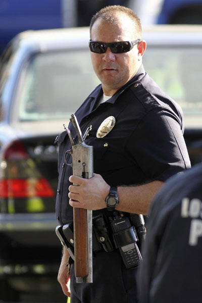 LA police buy back guns after school shooting