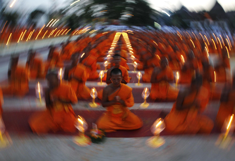 Buddhist monks pray for new year in Thailand