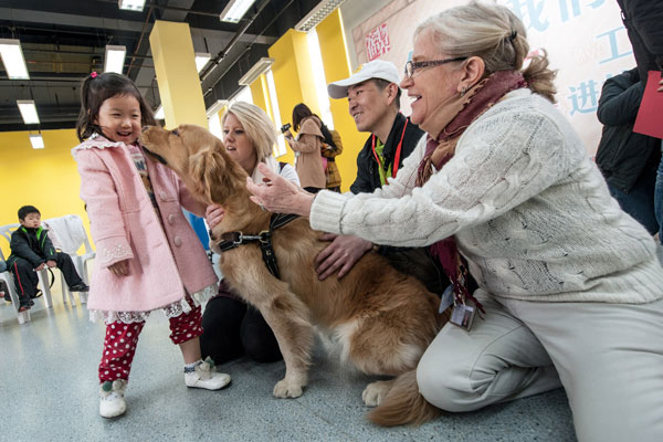 Working dogs meet children