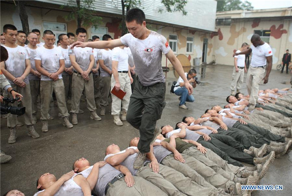 Trainees take security training course in Beijing