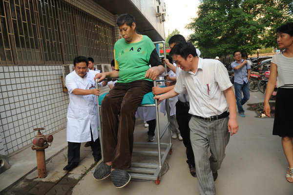 Asia's tallest man hospitalized